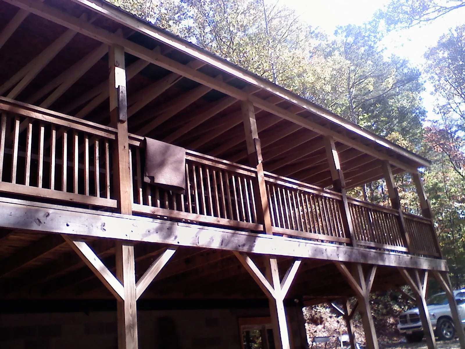 Timber framing under a new elevated porch and deck — Roof Leak Repair in Etowah by Roofing Brothers